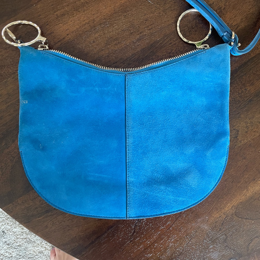 Nina Ricci, blue suede purse. in great shape you will notice wear